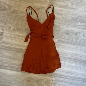 Forever 21 romper in a burnt orange color! New with tags ! Never worn